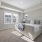 spacious bedroom with oversized windows