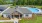 Image of clubhouse and pool with Lake Norman in background