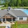 Image of clubhouse and pool with Lake Norman in background