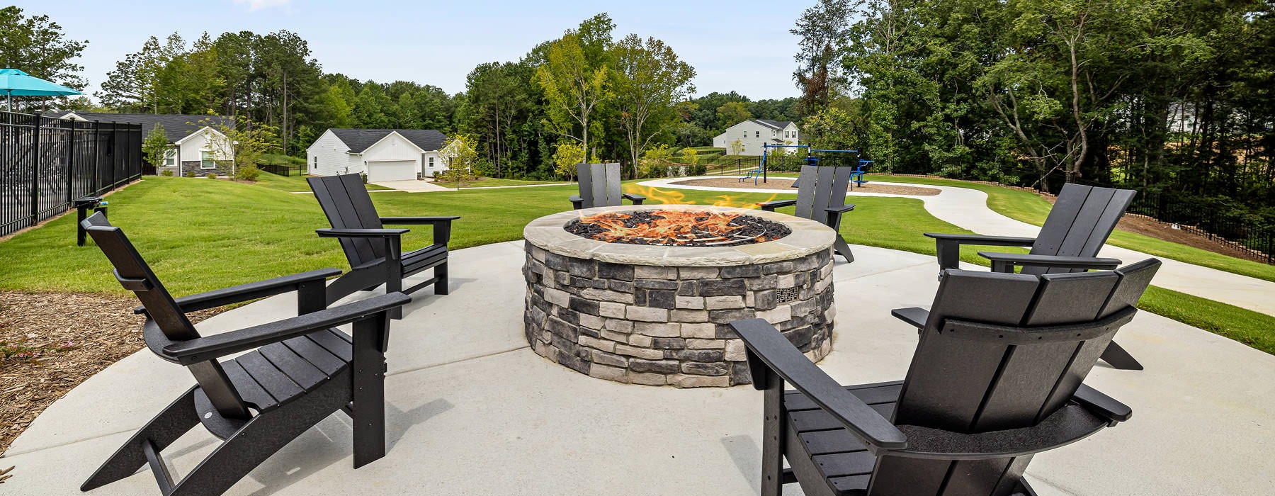 lawn chairs around outdoor fire pit